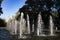 Mendoza Argentina Water fountain in the Plaza de la Independencia in the background a futuristic building of the city