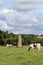 Menhir of Kerguezennec in the middle of grassland, Begard, Brittany, France