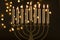 Menorah with candles near abstract garland lights . High quality and resolution beautiful photo concept