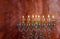 Menorah Hanukkah candles are burning in hanukkiah on light seven holiday day