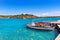 Menorca Es Grau clean port with llaut boats in Balearics