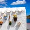 Menorca Es Grau white house flower pots detail in Balearic