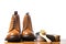 Mens Brogues Boots In Line With Cleaning Accessories on Shiny Table.Against White Background