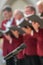 Mens choir performing in a cathedral