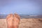 Mens feet on the beach