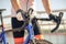 Mens hands in sports gloves holding bicycle handlebar