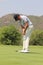 Mens pro golfer Jean van de Velde putting for a birdie on November 2015 in South Africa