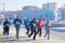 Mens and womans with thick hoarfrost on their hats run during the Christmas half-marathon in Omsk at minus 23