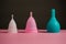 menstrual silicone cups different colors, shapes and capacity for menstruation cycle. Sustainable and comfortable