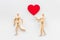 Mental and emotional gender difference between man and woman. Two wooden mannequin figurine connection