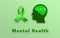 Mental health concept. Man Head With green Brain sign and Awareness Ribbon symbol on Green background
