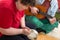 Mentally disabled woman playing a tambourine