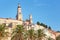 Menton bell tower and old city houses in the morning