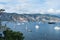 Menton, France. View of yachts, boats, mountains and sea on the Cote d`Azur on a sunny day. A luxury getaway on the French Rivier