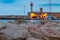 Menton. Stone lighthouse on the breakwater at the entrance to the port.