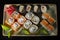 Menu of the Japanese restaurant. Several sushi laid out on a plate with ginger sauce wasabi. Rolls from above.Seth sushi on a
