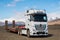 Mercedes Benz Actros Lorry with a machinery trailer in the Icelandic countryside