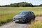 Mercedes-Benz B-Class on an unpaved country road among the fields