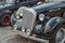 Mercedes wedding car with bouquet on fender