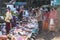 Merchants and customers with coat and hood are selling clothes on the railway in winter from Tiger Hill at Darjeeling, India