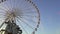 Mercury riding Pegasus marble statue and giant Ferris wheel in Tuileries Garden