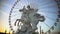 Mercury riding Pegasus statue and giant Ferris wheel in Tuileries Garden, Paris