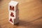 Mergers and acquisitions, M and A business concept. Letters on wooden cubes