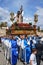 Merida, Spain. April 2019: A group of bearers, called Costaleros, carrying a religious float