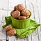 Meringue almond cookies in a green bowl