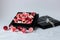 Meringue pink with red flowers in black box