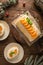 Meringue roll cake with cream, tangerine
