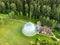 MERKINE, LITHUANIA - AUGUST 16, 2018: Merkine Pyramid, protected by a glass dome, famous for healing and spiritual uplifting