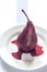 Merlot-poached pear on the plate