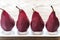 Merlot-poached pears on the plate