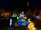 Mermaid sculpture luminous in park at Christmas by night