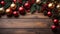 Merry Christmas background. New Year\\\'s decorations on wooden table - colorful balls and gifts. Top view with copy space