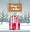 Merry christmas card with gifts in snowscape