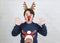 Merry Christmas.Child in a Rudolph Reindeer christmas costume