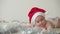Merry christmas christmas and happy new year, infants, childhood, holidays concept - close-up 6 month old newborn