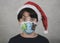 Merry Christmas,Close-up of kid with funny christmas medical mask