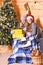 Merry Christmas Cute girls with yellow present boxes