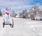 Merry christmas a funny party snowman sleighing down a ski hill slope on a sled in snowy weather