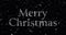 Merry Christmas glowing text appearing and falling snowflakes
