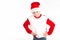 Merry christmas. Happy New Year. Caucasian young schoolboy in Santa costume. White background