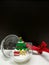 Merry Christmas and Happy New Year, colorful Xmas tree and tiny gift box toy decoration in the clear ball