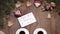 Merry Christmas and happy new year concept. Cups of coffee placed on wooden background together with fir tree branches