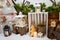 Merry Christmas and Happy New Year decorations standing on artificial snow. White wooden box, lanterns, candles, wooden toys