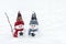 Merry christmas and happy new year greeting card with copy space Happy two little snowmen in red, blue cap and scarf standing in