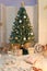 Merry Christmas and Happy New Year living room interior with decorated firtree, golden garland lights, star, white candles