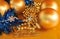 Merry christmas metal text and ornaments on gold background